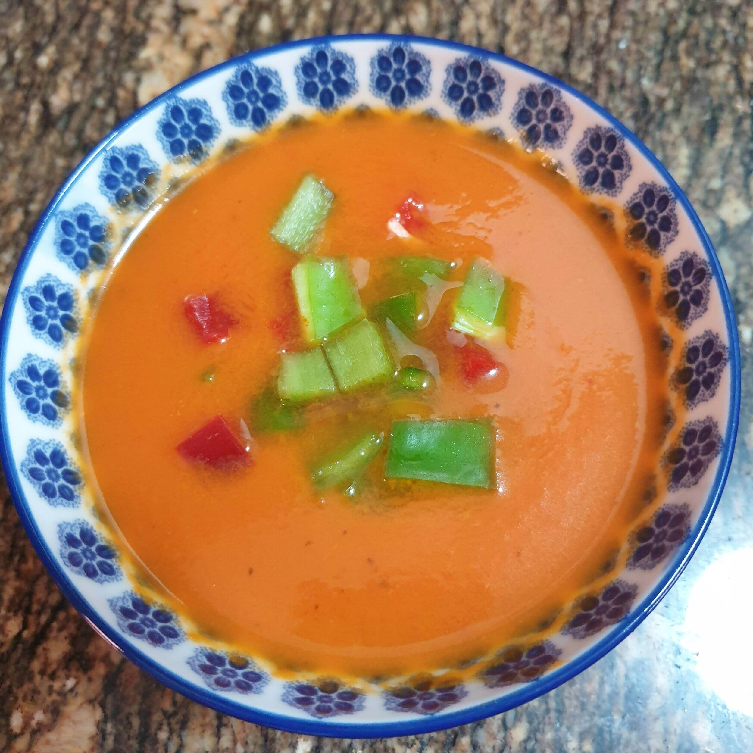 You can serve gazpacho plain in a glass or with toppings in a bowl.