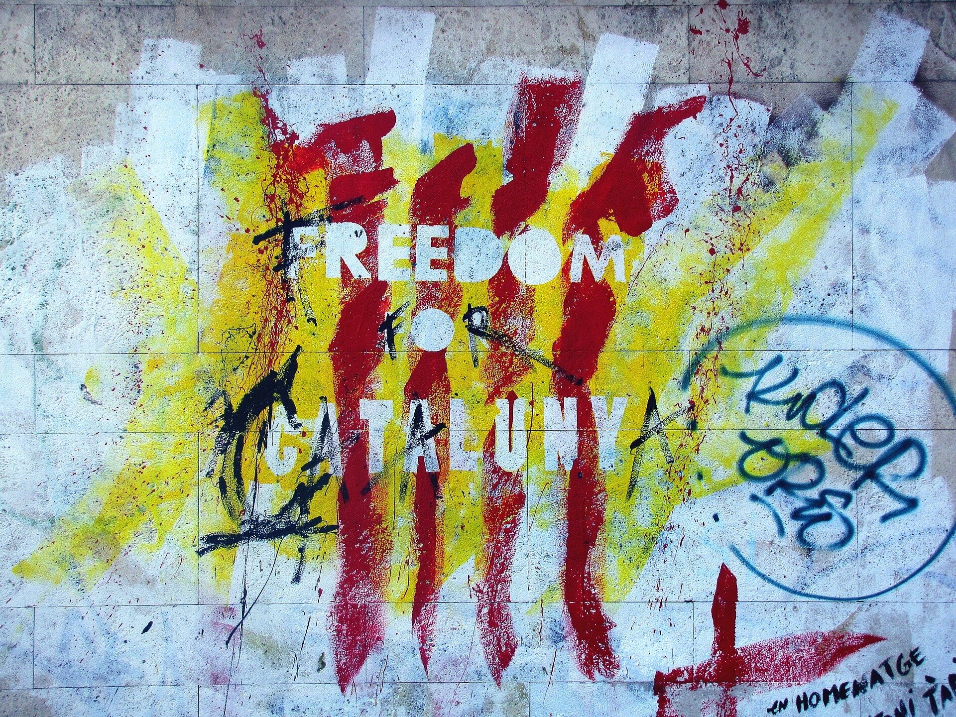 Graffiti for the Catalan separtist movement. Photo by (Joenomias) Menno de Jong on Pixabay.