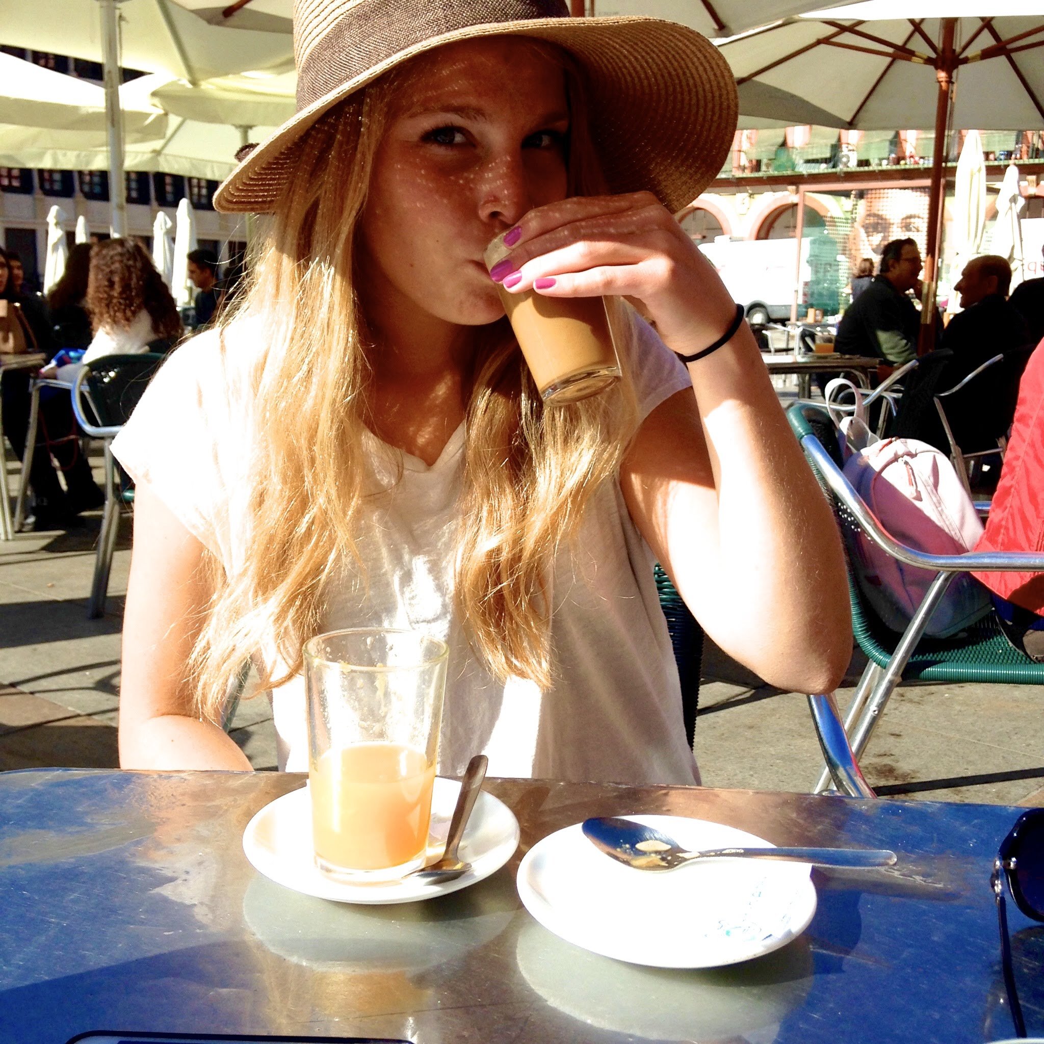 Monika drinking café con leche in Spain