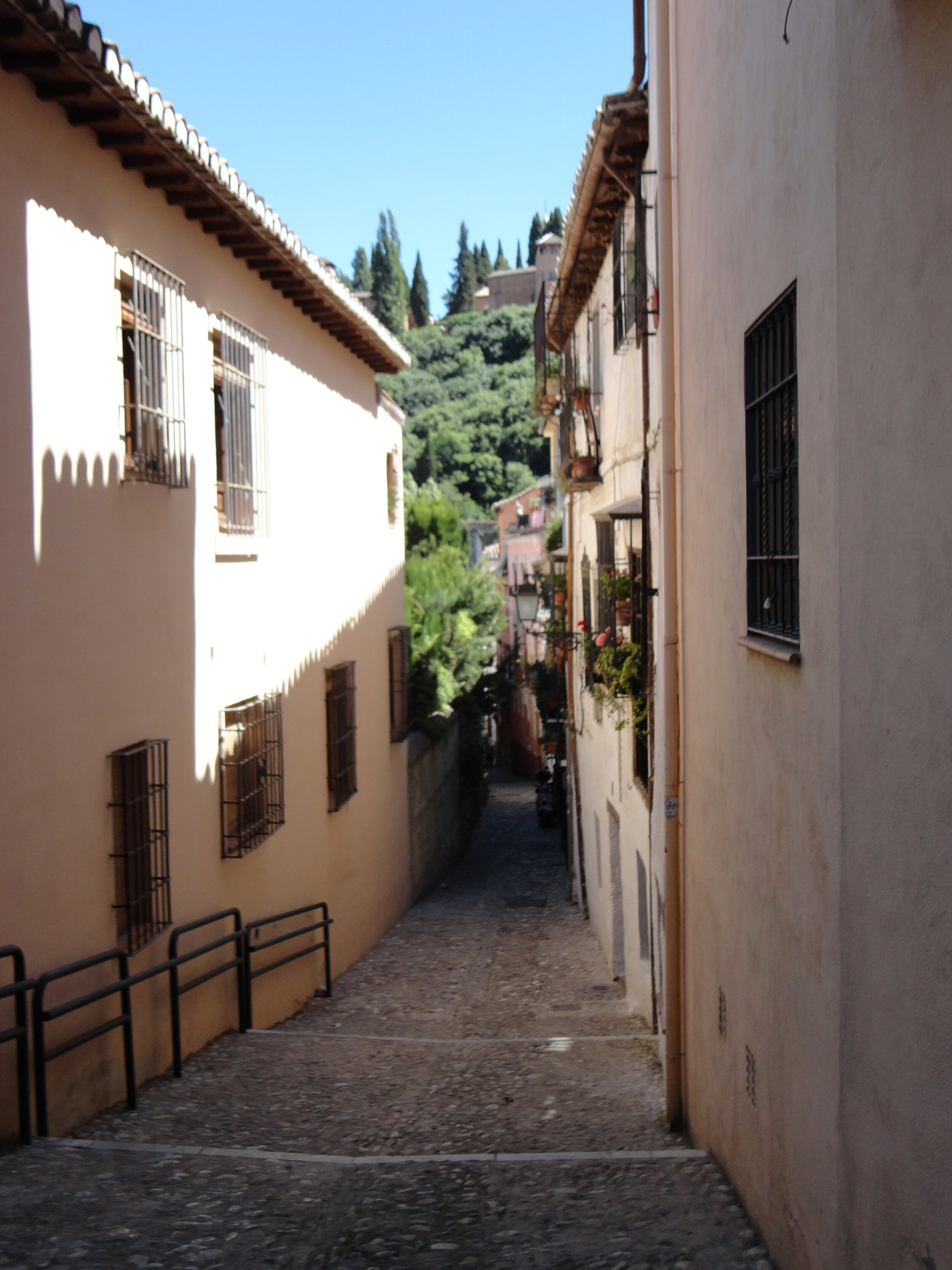 Windy streets with a view of the Alhambra. Granada, Spain